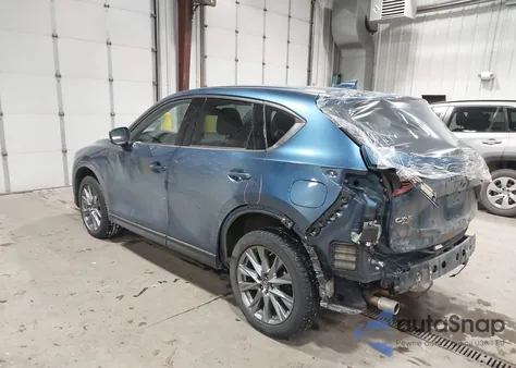2021 Mazda Cx-5 Grand Touring z USA, uszkodzony, nr VIN JM3KFBDM3M1405602